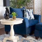 Poltrona accentuata in tessuto blu navy, schienale a cuscino, seduta singola